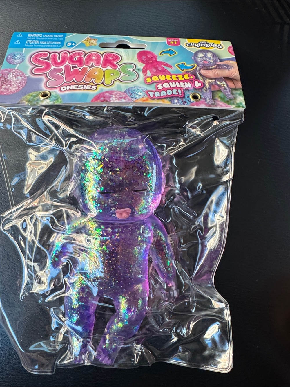 Sugar Swaps Onesies Purple Glitter Squishy Toy